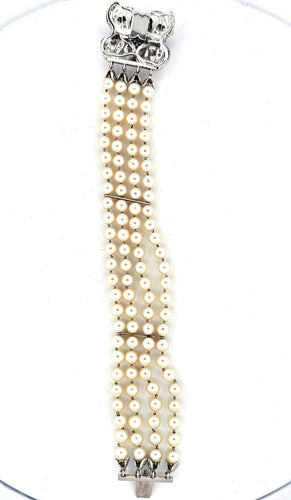 Bracelet de perles avec fermoir en or blanc 18 carats et diamants