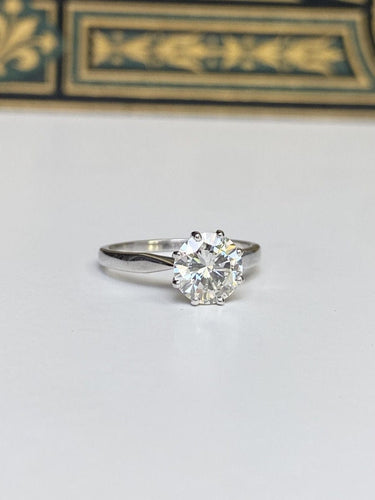 Bague solitaire en or blanc et diamant