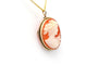 Pendentif Pendentif Années 50 en or jaune serti d'un camée 58 Facettes 23038