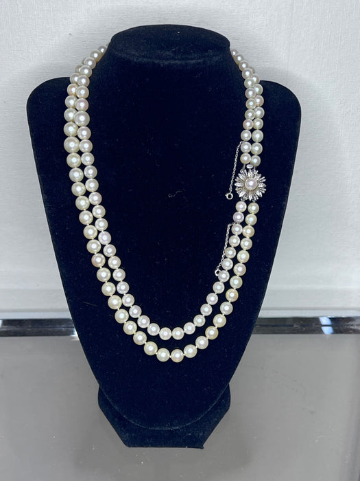 Superbe collier double rang 124 perles de culture fermoir or et diamants