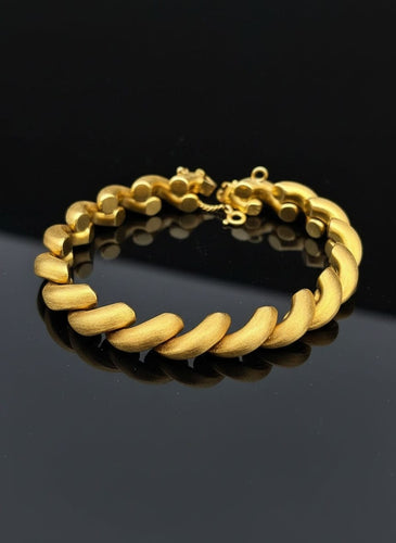 Bracelet Bracelet tressé plaqué or 18 carats 58 Facettes