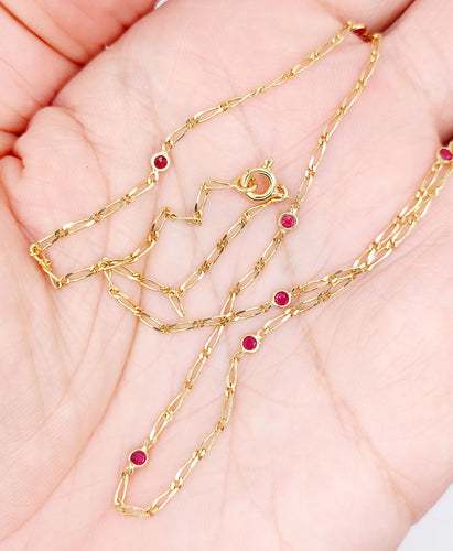 Collier Chaine vintage or jaune mailles gourmette et rubis 58 Facettes B01012