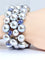 Bracelet Important bracelet or blanc, saphirs étoilés, diamants et perles grises 58 Facettes AB632