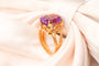 Bague Bague or jaune motif corde sertie d’une améthyste 58 Facettes 250317