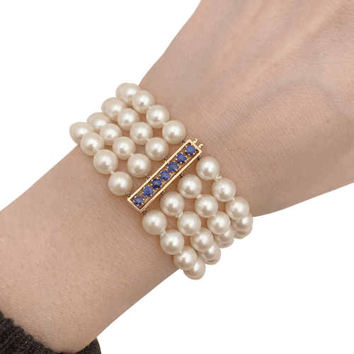 Bracelet Bracelet perles de culture 4 rangs, or jaune, saphirs. 58 Facettes 34535