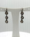 Boucles d'oreilles Longues dormeuses or gris serties de diamants 58 Facettes