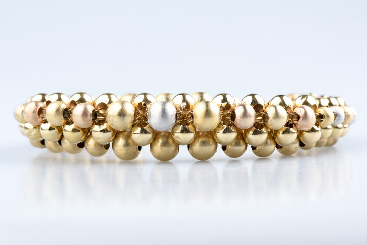 Bracelet Bracelet boules en trois ors 18k or jaune, blanc et rose 58 Facettes BRBLECC1325-107