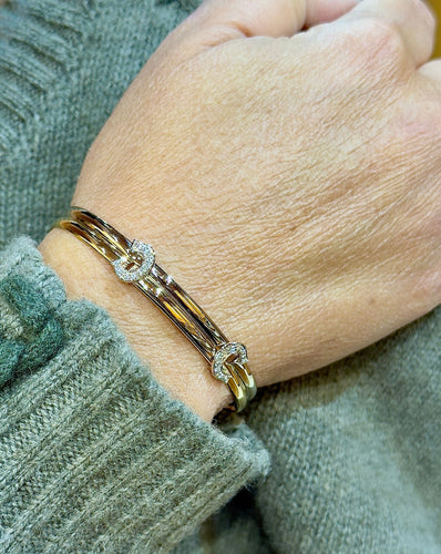 Bracelet Bracelet Cartier vintage double C en or et diamants 58 Facettes