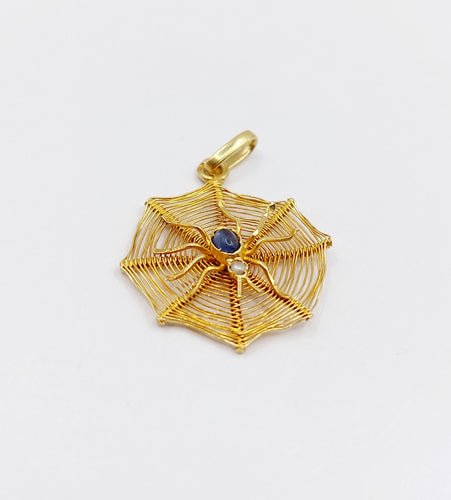 Pendentif vintage or jaune araignée sur sa toile, pierre bleue et perle 58 Facettes A06223