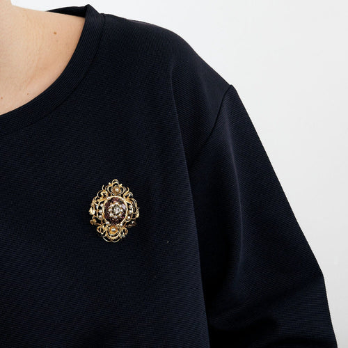 Broche Broche à décor de rinceau et fleurs avec émail noir, perles et grenats 58 Facettes