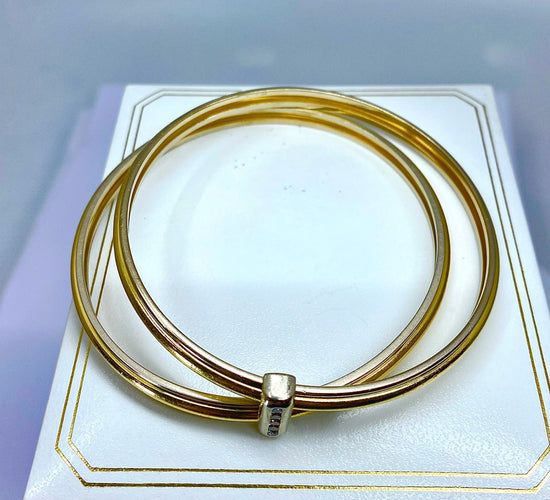 Bracelet Bracelet double joncs, or blanc, diamants, Yves Saint Laurent 58 Facettes AB601