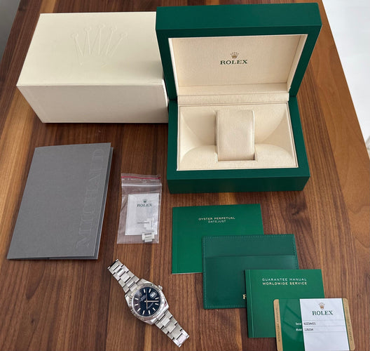 Montre ROLEX - Collection "Datejust 41mm", montre acier et or blanc (full set) 58 Facettes