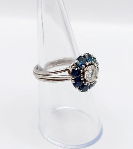 Bague 52 Bague marguerite Art déco en platine et diamant 0,65 ct, saphirs 58 Facettes A06577
