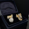 Boucles d'oreilles Boucles d'oreilles vintage années 80 en or jaune avec diamants 58 Facettes 60737