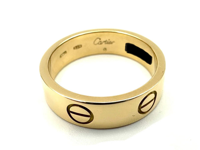 Bague 56 CARTIER. Collection "LOVE", Bague or jaune 18K 58 Facettes