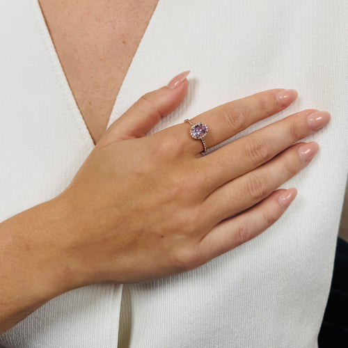 Bague Bague en or rose avec améthyste ovale 1,28 ct et saphirs blancs 58 Facettes 2508010