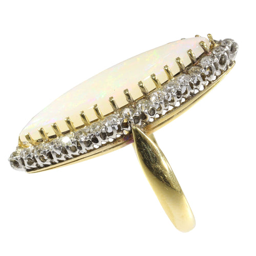 Bague 55 L'élégance victorienne : le chef-d'œuvre de la bague en opale et diamant de 1880 58 Facettes 16054-0031