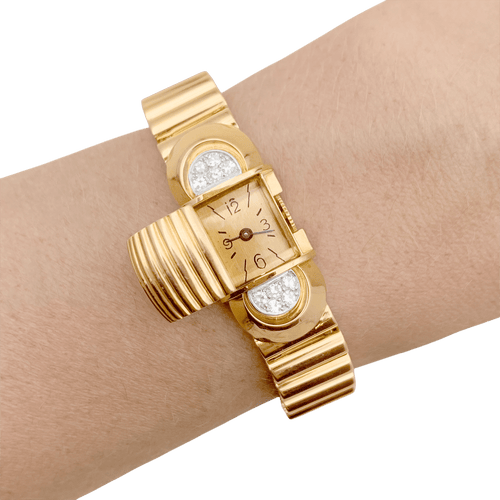 Montre Montre vintage secrète UTI, or jaune et diamants. 58 Facettes 34615