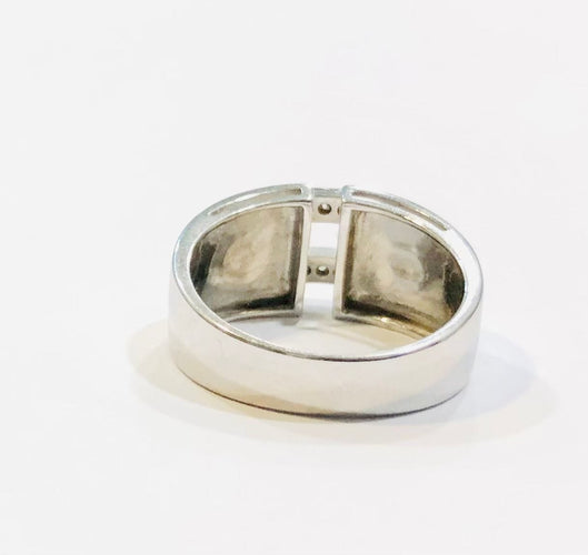 Bague 54 Bague or blanc et diamants 58 Facettes