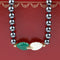 Collier Collier Cartier Patiala en or 18 carats avec hématite, calcédoine verte, nacre et diamants taille brillant 58 Facettes 1128844