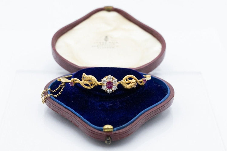 Bracelet Bracelet ancien motif phénix en or jaune 14k avec rubis et diamants 58 Facettes 11397