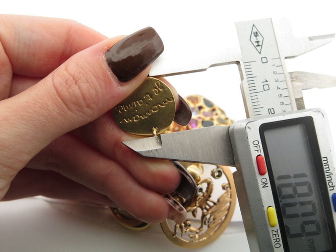 Bracelet bracelet gourmette breloques coeur zodiac t18 or jaune 18k 90.5gr charms 58 Facettes 270131