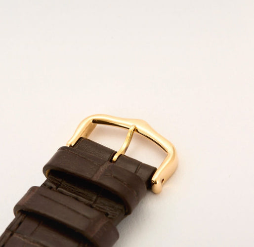 Montre Hermès -  Montre Tank solo or jaune 58 Facettes