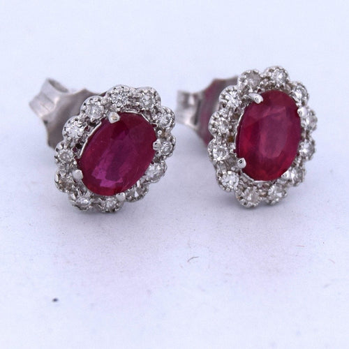 Boucles d'oreilles en or blanc avec rubis et diamants