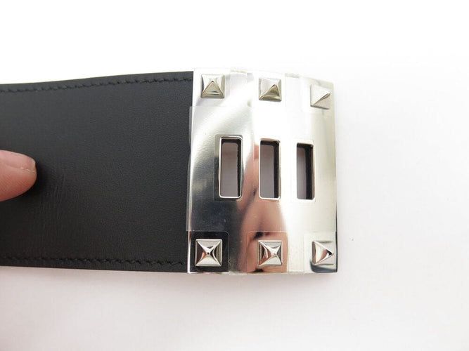 Bracelet bracelet HERMES extreme kelly dog manchette en cuir noir 50mm 58 Facettes 267199