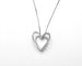 Collier Collier en or blanc 18 carats avec pendentif en forme de cœur et diamants naturels de 0,22 carat. 58 Facettes 4726