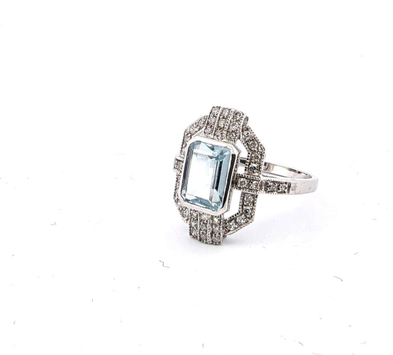 Bague 54 Bague en or blanc avec aigue-marine et diamants 58 Facettes