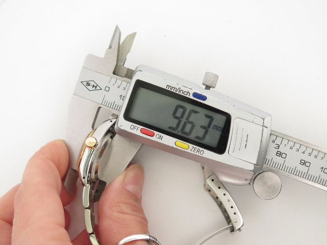 Montre vintage montre ROLEX oyster perpetual lady 67243 24mm acier or jaune auto 58 Facettes 272072