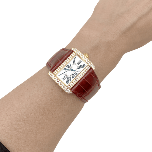 Montre Montre Cartier, "Tank Divan", or jaune et diamants. 58 Facettes 34640