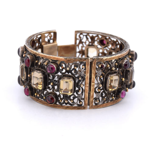 Bracelet Bracelet Buccellati vintage en or jaune 18 carats orné de béryls et de grenats 58 Facettes