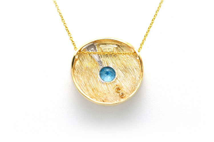 Pendentif années 70 en or jaune et blanc serti d'une topaze et de diamants (+-0.02ct) 58 Facettes 22638