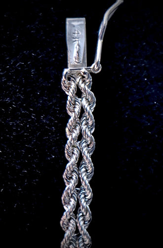 Bracelet Bracelet en or torsadé et serti de brillants 58 Facettes