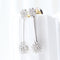 Boucles d'oreilles Longues boucles d'oreilles en or blanc 18 carats ornées de rosettes de diamants 58 Facettes VV1-F