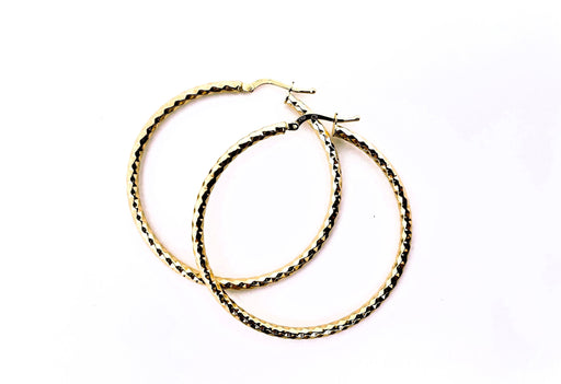 Large yellow gold faceted hoop earrings 58 Facettes
