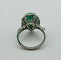 Bague Bague en platine avec une émeraude naturelle taille poire, entourée de diamants. 58 Facettes 50159