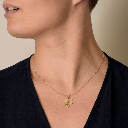 AUGIS - Chaîne retenant une Médaille d'amour en or jaune