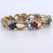 Bracelet Bracelet en or jaune orné de diamants et de pierres de couleur 58 Facettes