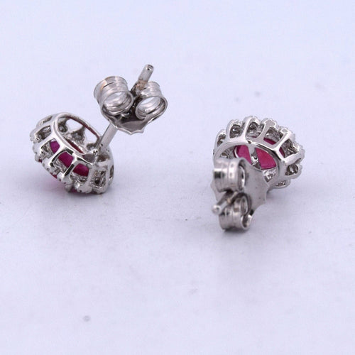 Boucles d'oreilles en or blanc avec rubis et diamants
