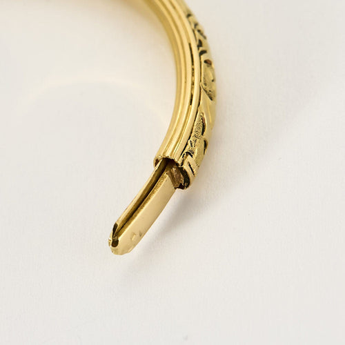 Bracelet Bracelet jonc en or jaune à motif végétal 58 Facettes SOR1095