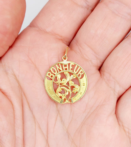 Pendentif Pendentif Art Nouveau or jaune BONHEUR fer à cheval et branche de gui (circa 1920) 58 Facettes A06259