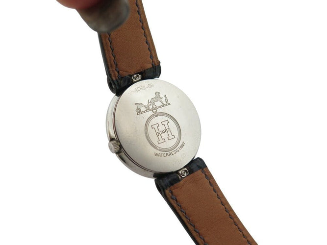 Montre vintage montre HERMES clipper 26 mm en or 18k et acier quartz  lady 58 Facettes 268714