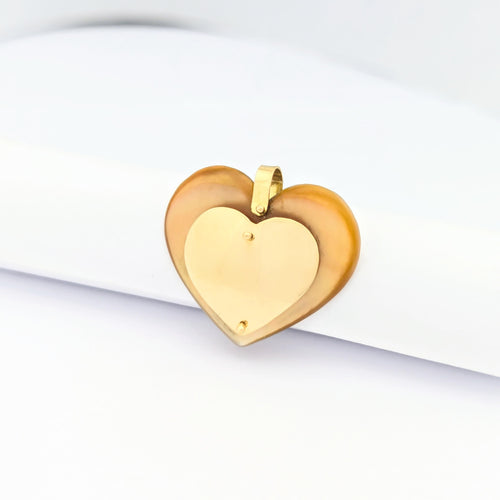 Pendentif Pendentif cœur en or jaune et nacre 58 Facettes 30069