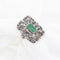 Bague Bague vintage en or et argent avec émeraude 58 Facettes 16925