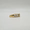 Bague 54 Bague or jaune, diamant rond et diamants baguettes 58 Facettes