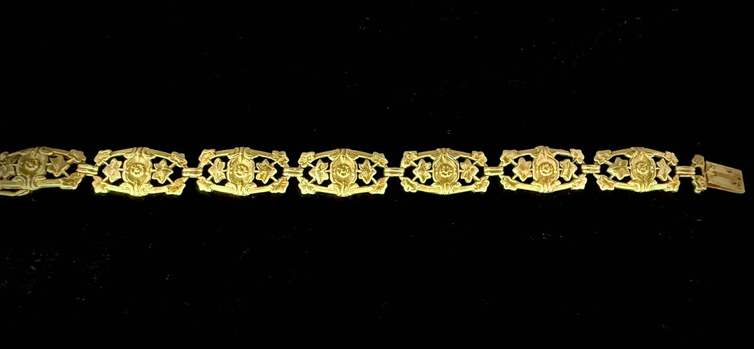Bracelet Bracelet Art Nouveau or jaune composé de 7 mailles à décor floral 58 Facettes