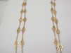 Long long necklace in old yellow gold with filigree 58 Facettes